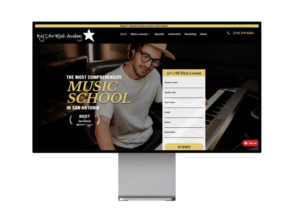 A computer monitor is displaying a website for a music school.