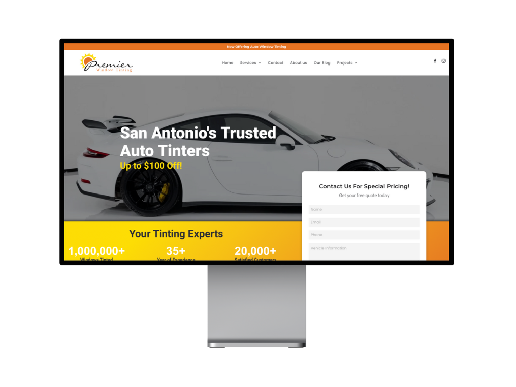 A computer monitor displaying a website for san antonio 's trusted auto tinters.