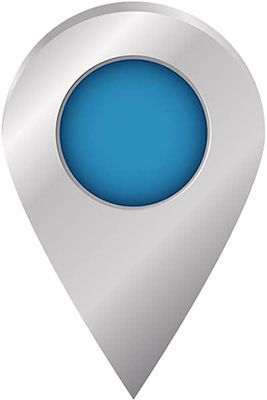 A silver pin with a blue circle in the middle on a white background.