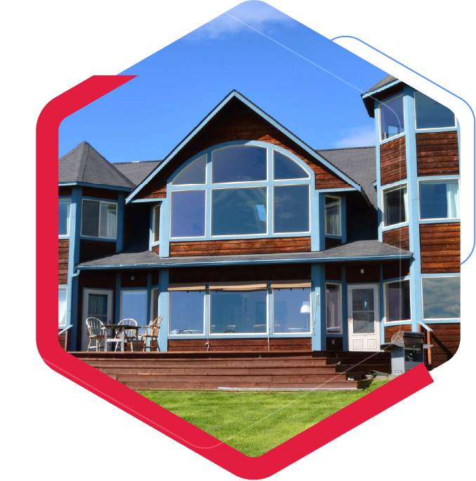 A large house with a lot of windows has a red border around it