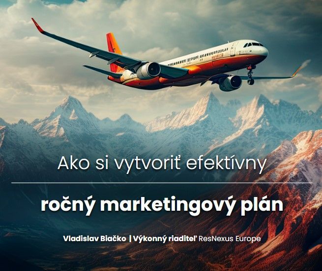 A woman is holding a pen in front of a laptop computer.