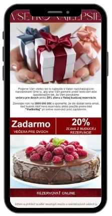 A cell phone with a happy anniversary email on it.
