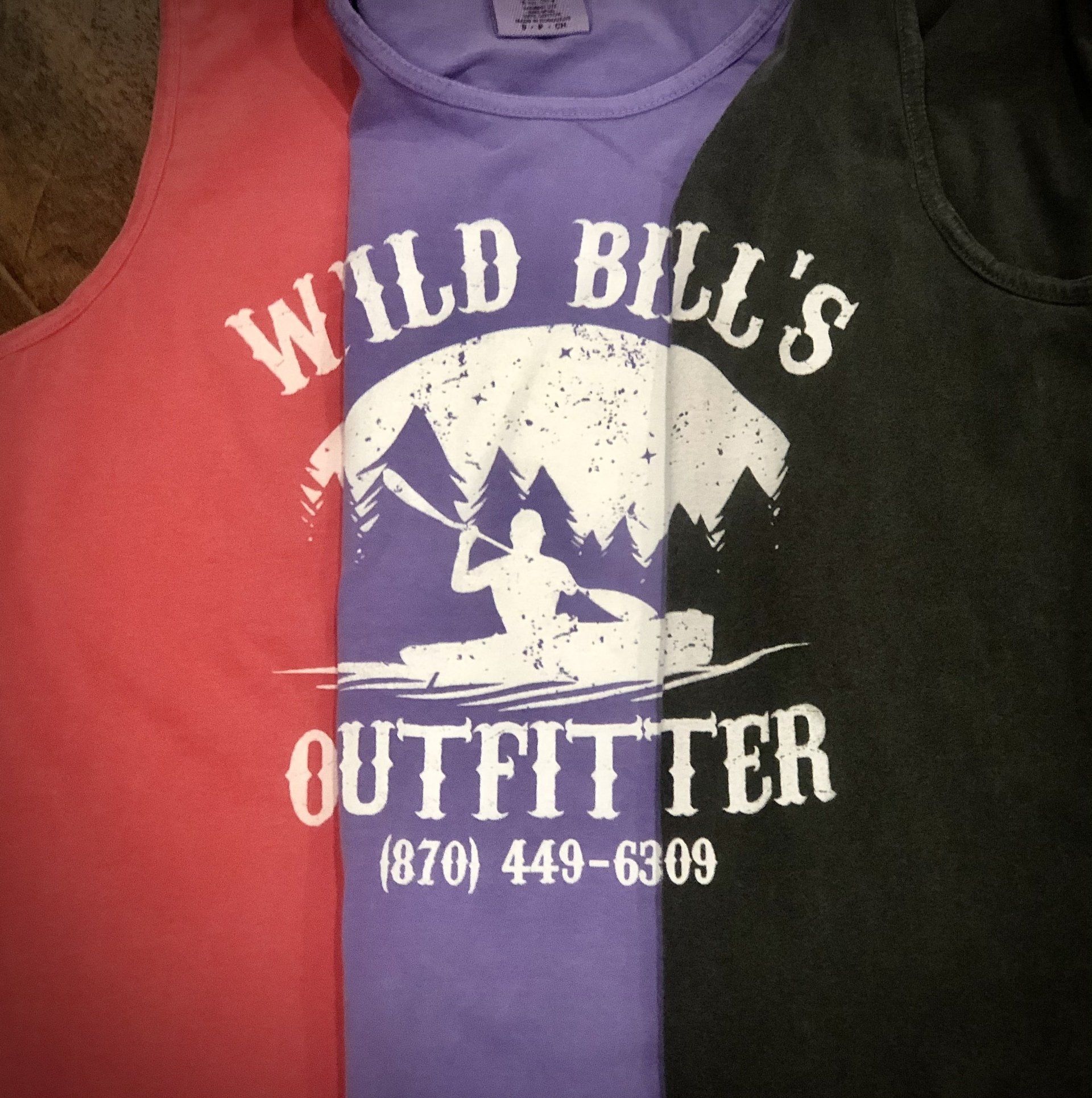 three shirts that say wild bill 's outfitter on them