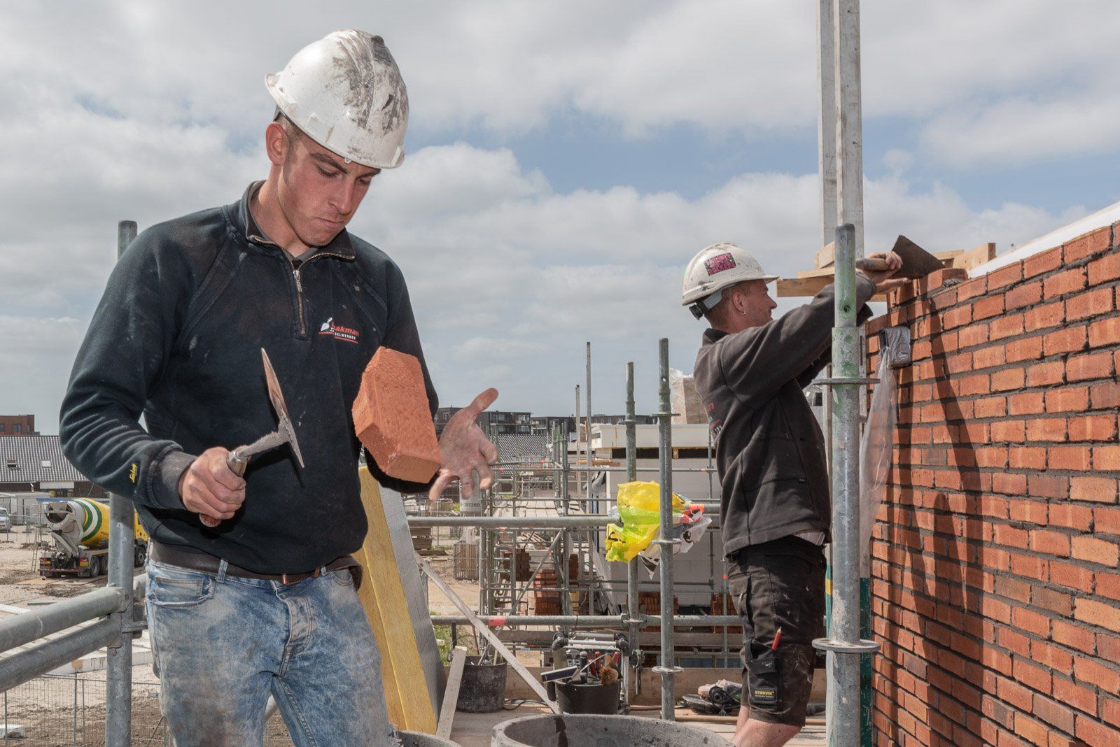 Portfolio Walter Frisart FOTOwerk Bouwfotograaf, Bouwplaatsfotograaf en projectfotograaf:  Metselaar klist steen Zeewolde voor Salverda Bouw