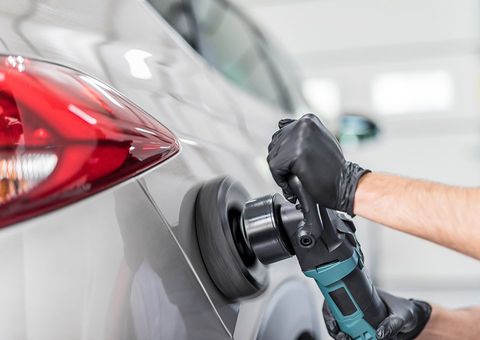 Automotive Cleaning Supplies — Man Using Car Polishing Equipment in Darlington, PA