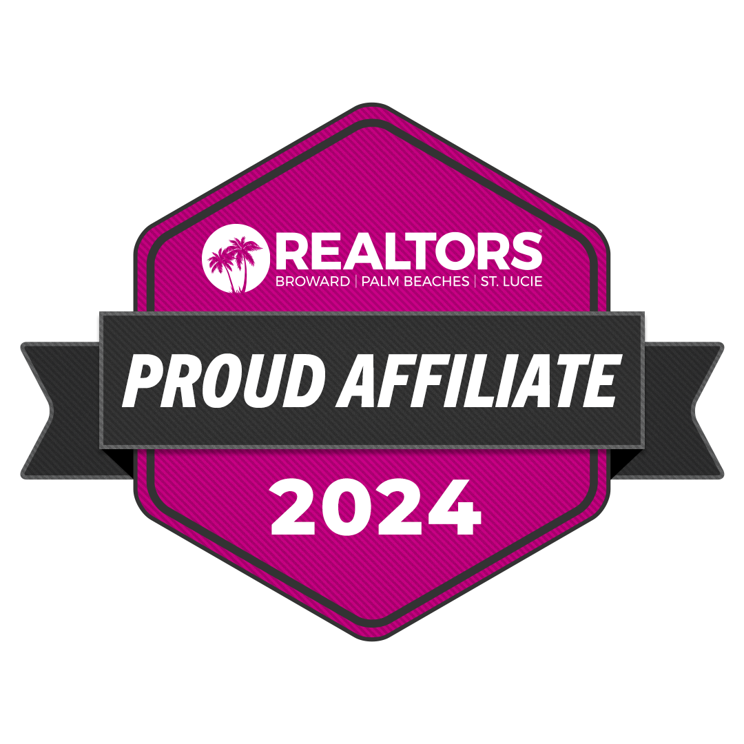 A purple badge with a black ribbon that says `` realtors proud affiliate 2024 ''.