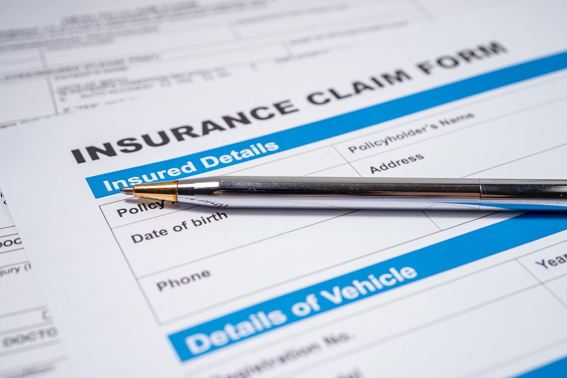 Homeowner reviewing claim paperwork