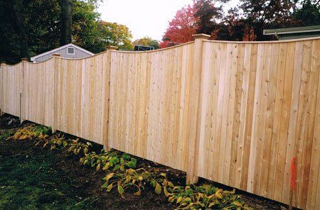Six-foot, one-inch by four-inch scalloped board with a one-inch by two-inch strip cap