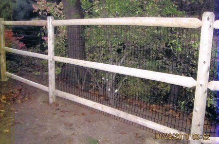 Five-foot post & rail with two-inch by four-inch welded wire