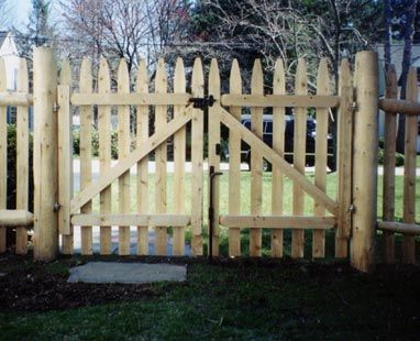 Four-foot stockade with round cedar posts