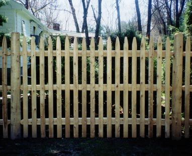 Four-foot stockade with round cedar posts