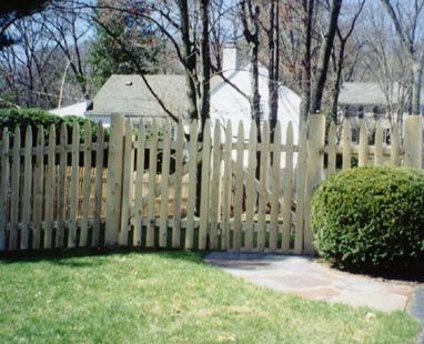 Four-foot stockade with round cedar posts