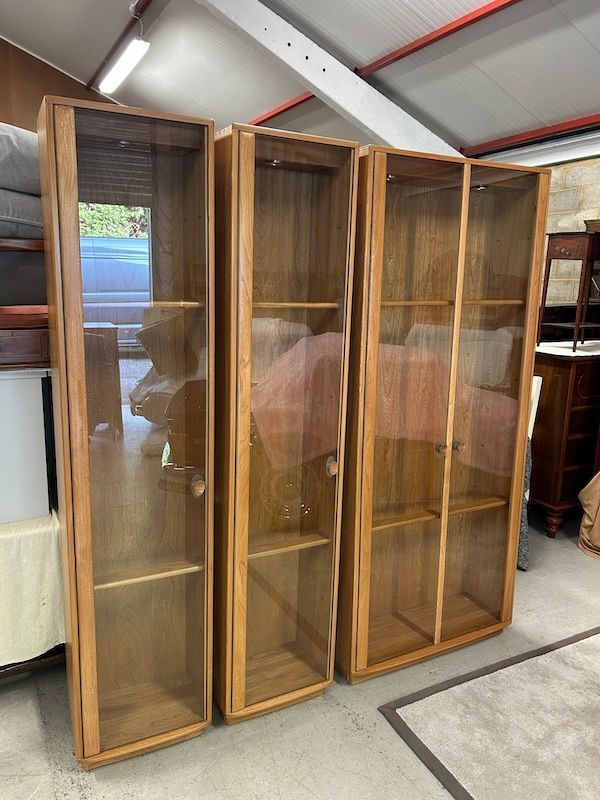 Three Ercol Tall Display Cabinets