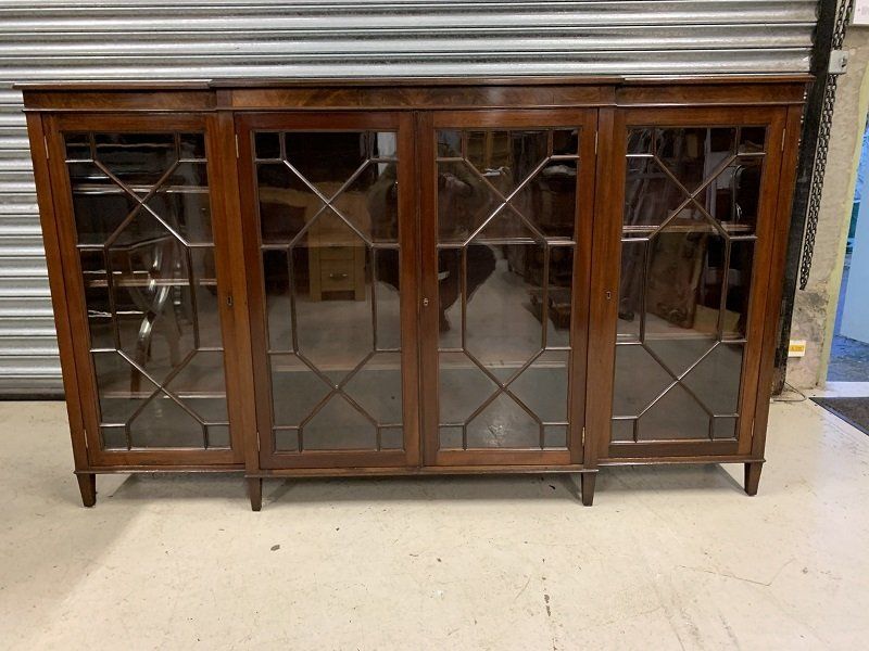 Quality Antique Mahogany Astral Glazed Breakfront Bookcase by Spillman & Co