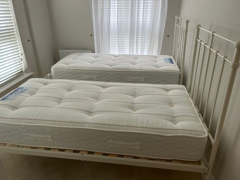 A Pair of Victorian Style White Enamel Single Bed Frames & Mattresses