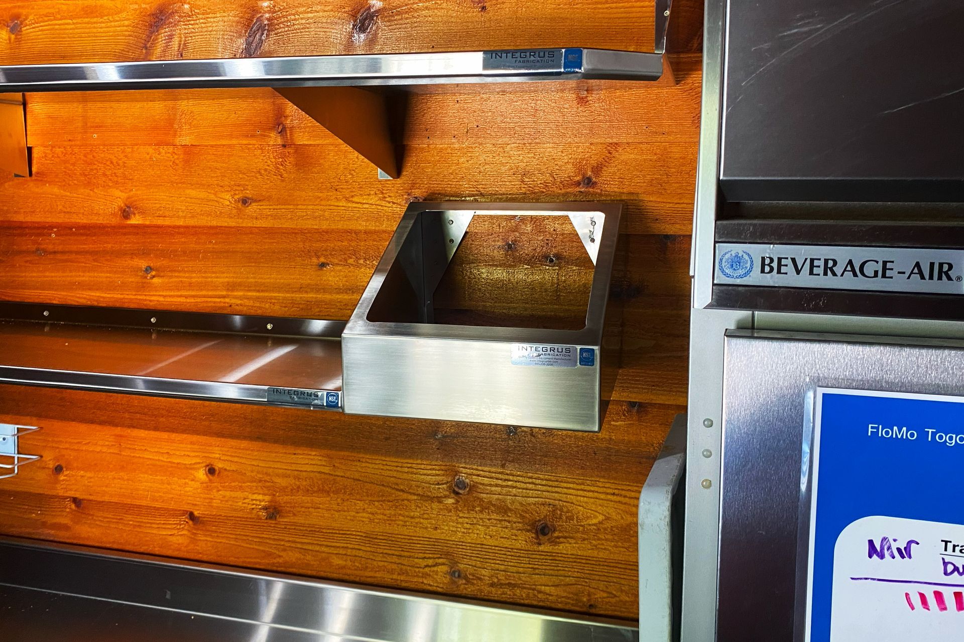 Photo of Panholder and shelves aside a Beverage-Air commercial kitchen fridge