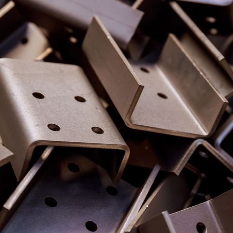 Turret-Punched metal pieces