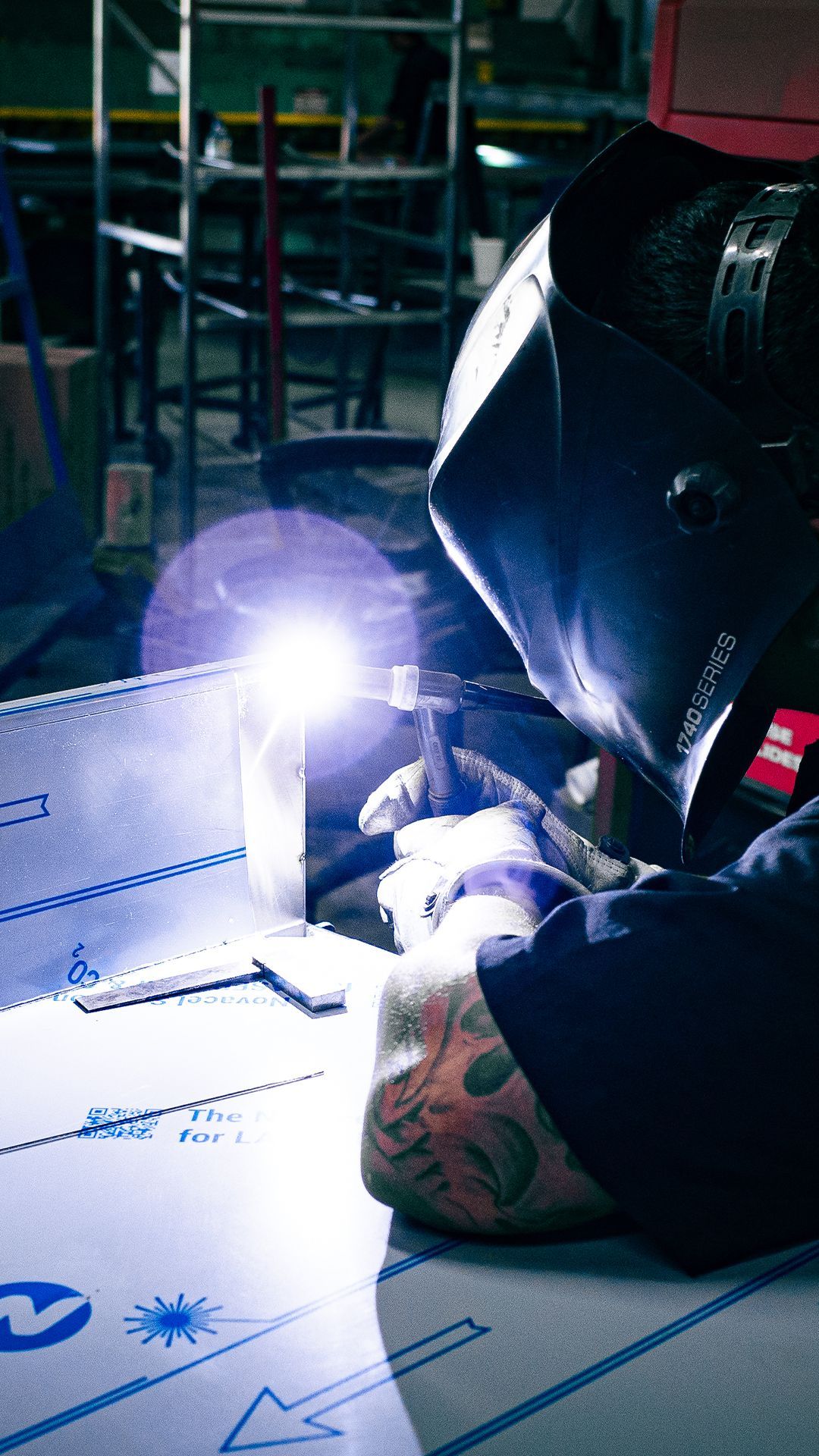 Integrus Team member welding custom metalwork