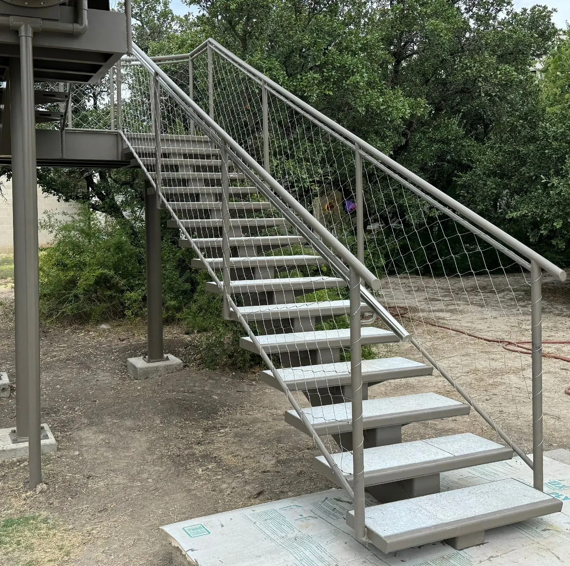 Photo of REsidential/Industrial outdoor staircase for pool, stair view