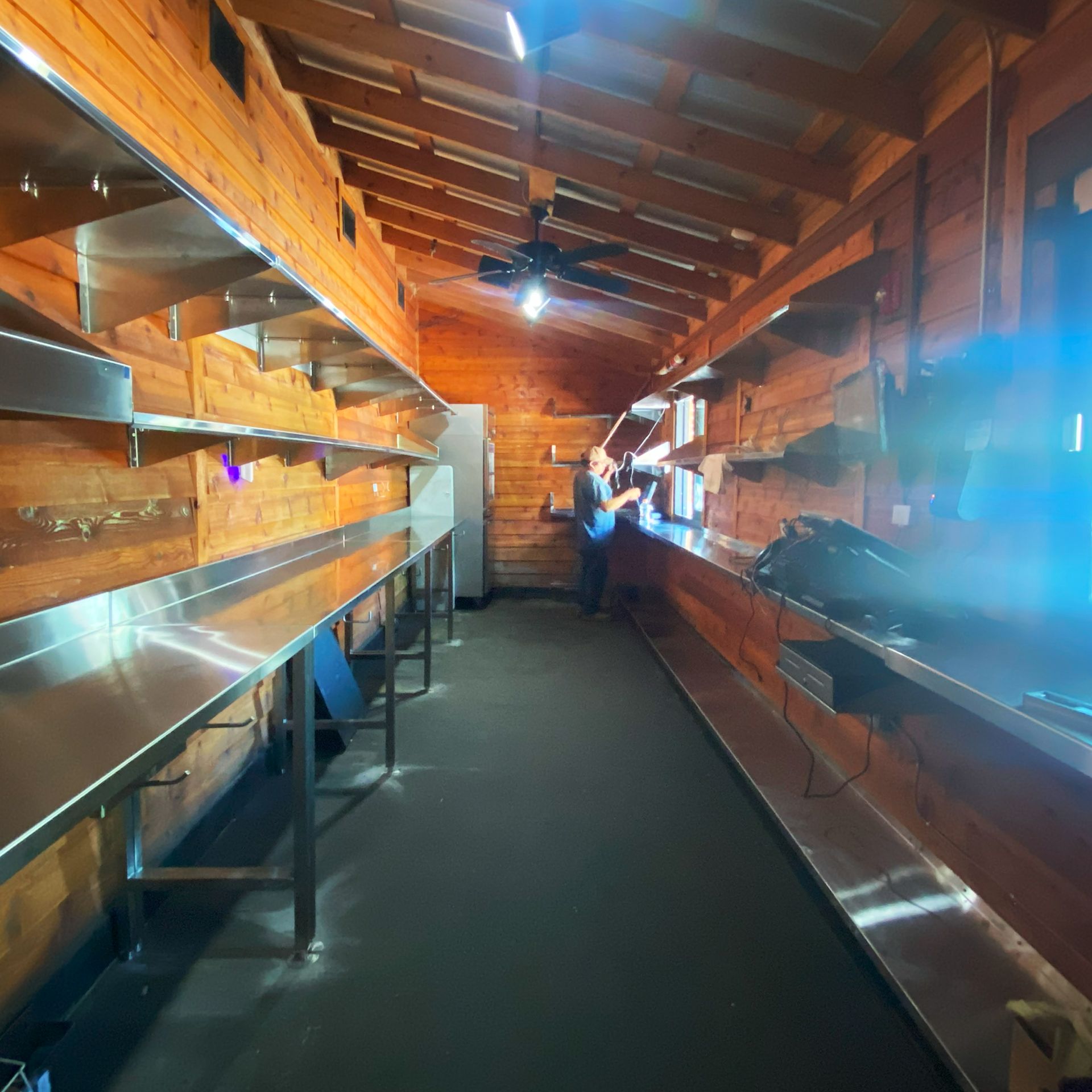 After Image of Texas Roadhouse To-Go Room with updated stainless steel shelving and tables
