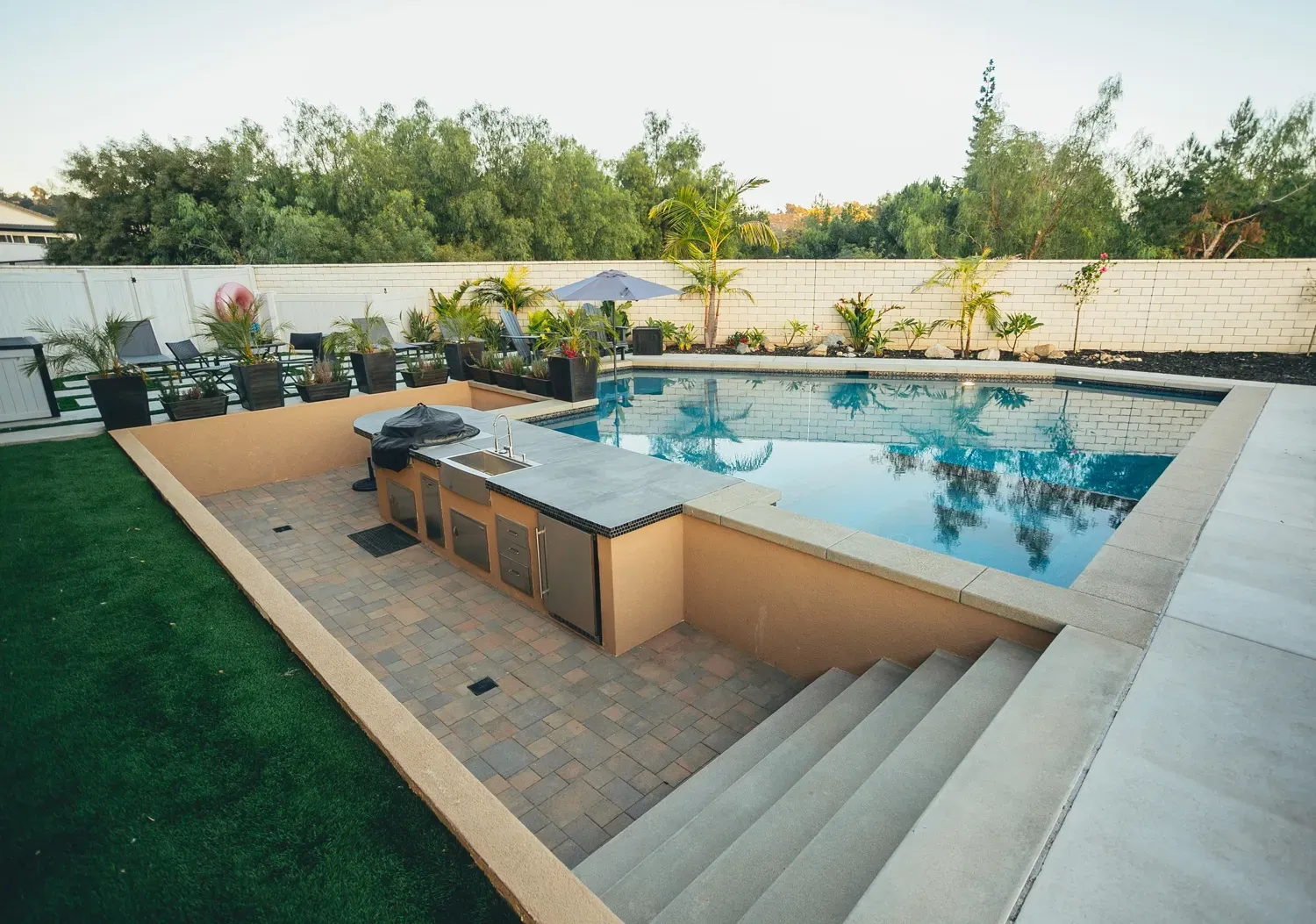Custom pool and landscape construction by Develoscapes