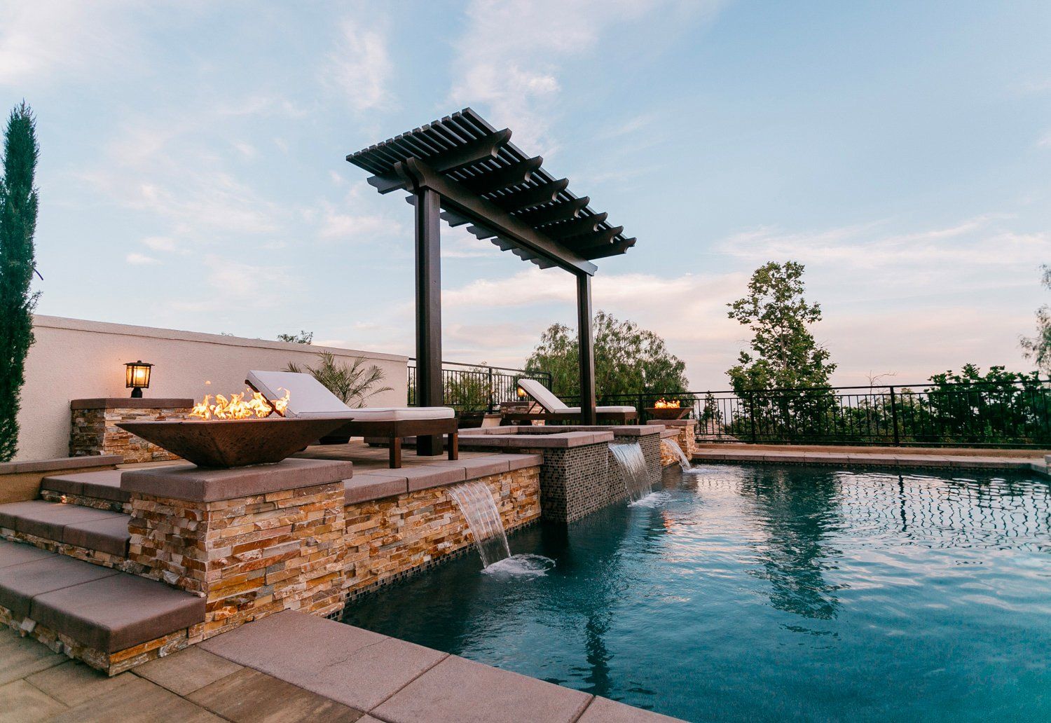 Custom outdoor living spaces and pools by Develoscapes