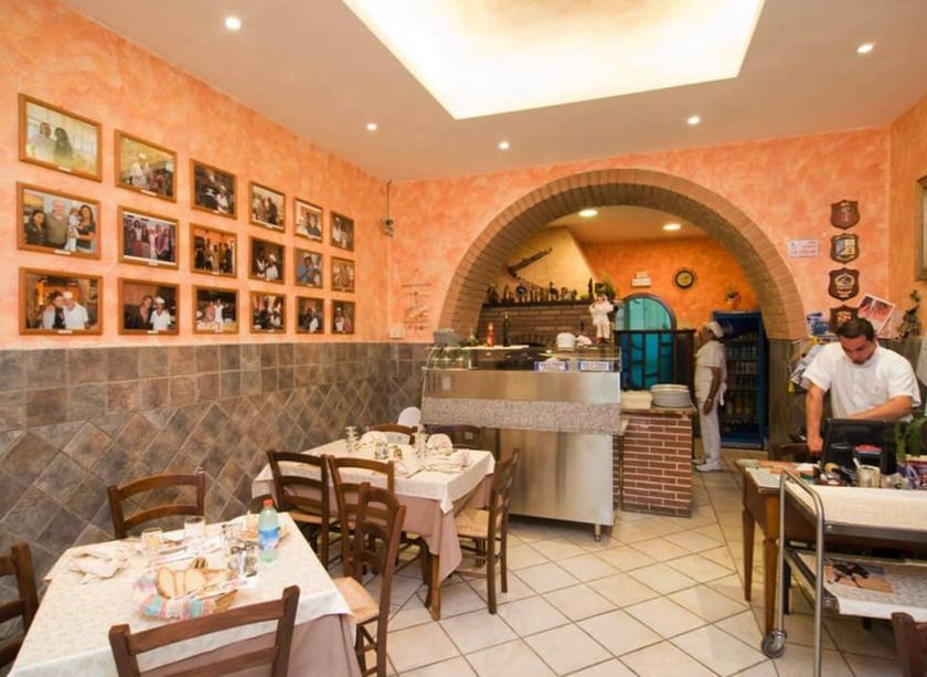 pizzeria con forno e legna