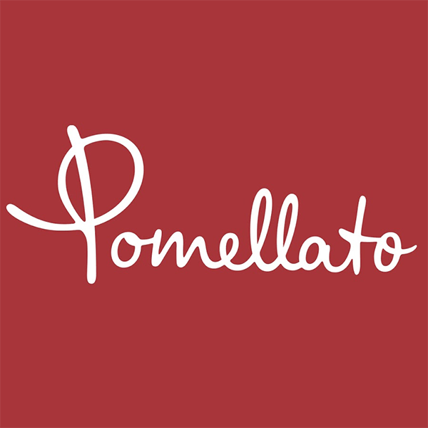 La parola pomellato è scritta in bianco su sfondo rosso.