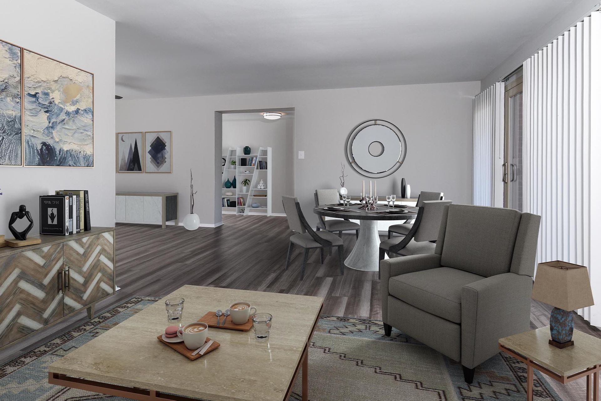 Living and dining room with furniture, decor, wood floor, and doorway to another room at Glenmont Station in Silver Spring, MD.
