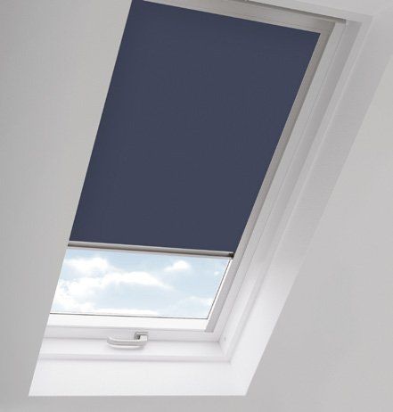 A skylight with a blue blind on it
