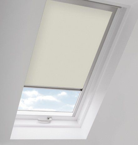 A white skylight with a white blind on it