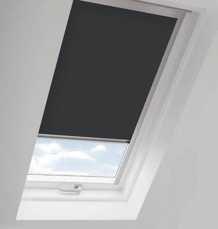 A skylight with a black blind on it