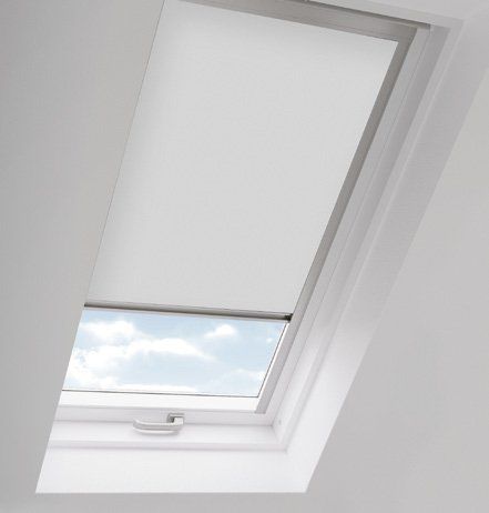 A white skylight with a blue sky in the background