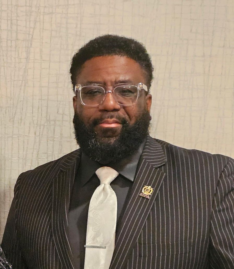 Mr. Aubrey H.J. Mitchell