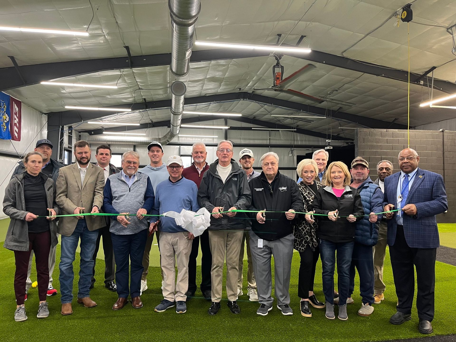 ribbon cutting at the gibson bay golf garage
