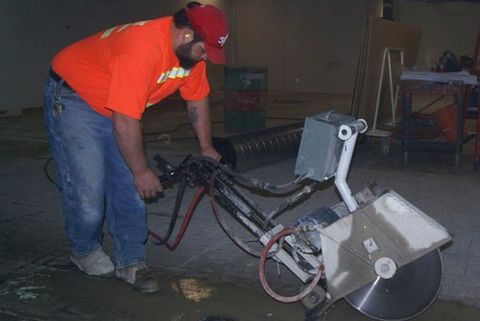 Man Cutting Concrete - Concrete Cutting Services in Milton, WA