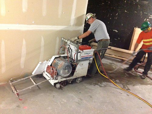 Worker Cutting Concrete - Concrete cutting in Milton, WA