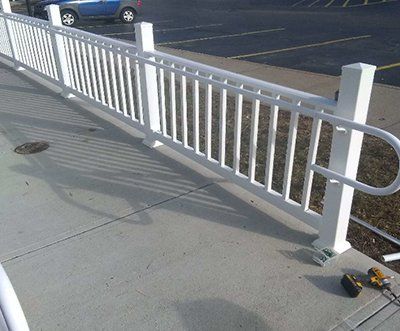 ada compliant sidewalk with railing