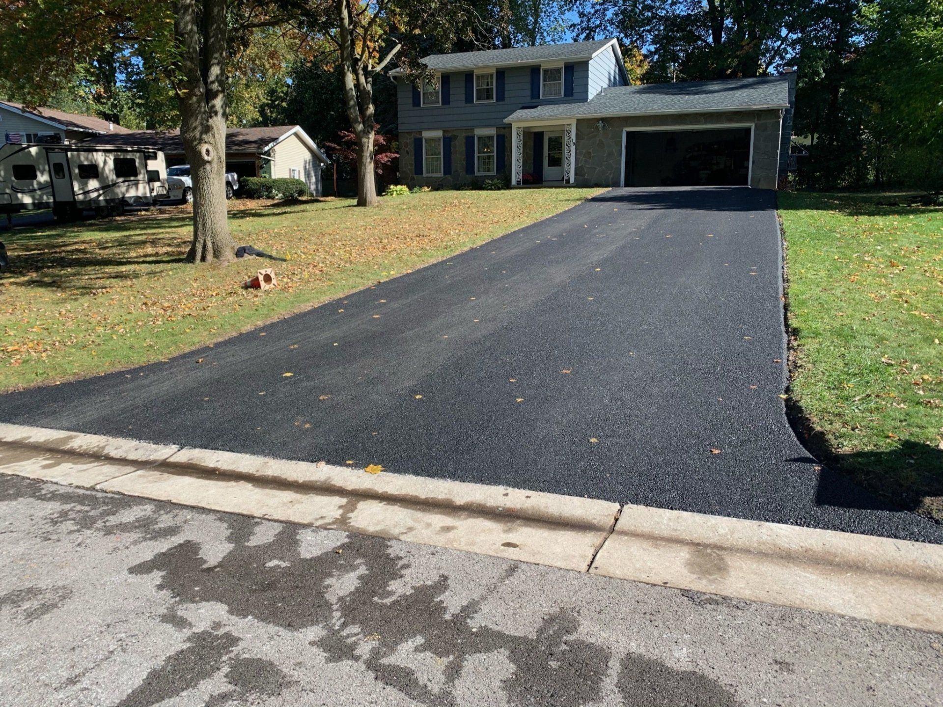 Expertly installed asphalt driveway by Universal Paving & Concrete in Rochester, NY, designed for residential and commercial properties.