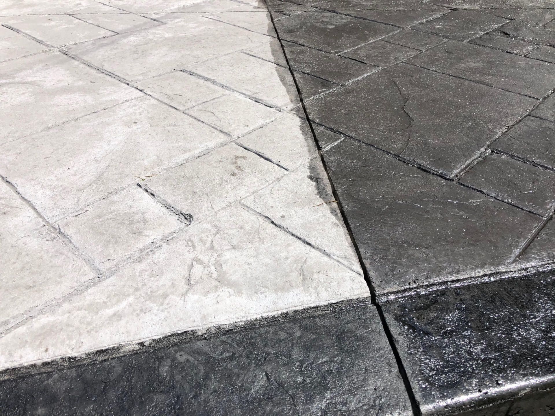 Close-up of a stamped concrete patio featuring textured designs, installed by Universal Paving & Concrete in Rochester, NY, adding curb appeal and lasting beauty.