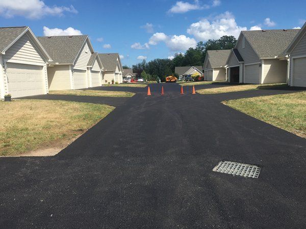 Professional commercial paving service by Universal Paving & Concrete in Rochester, NY, providing smooth, durable surfaces for parking lots, walkways, and more.