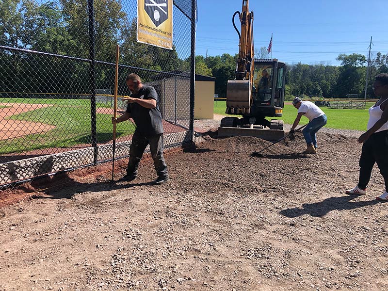 Before and after stamped concrete patio transformation by Universal Paving & Concrete in Rochester, NY.