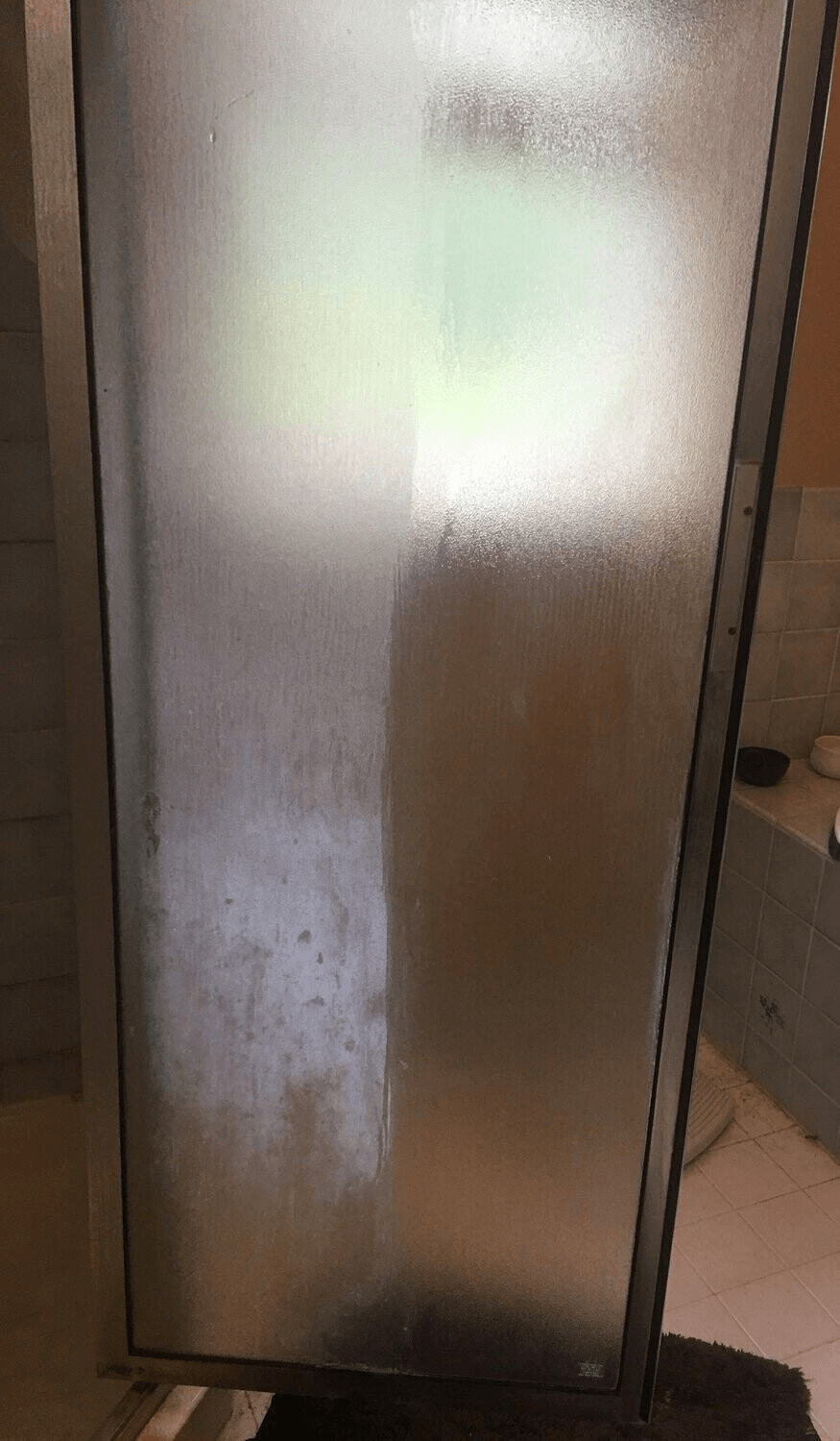 7 Ways You Can Clean Your Shower Door Tracks (Even Those With