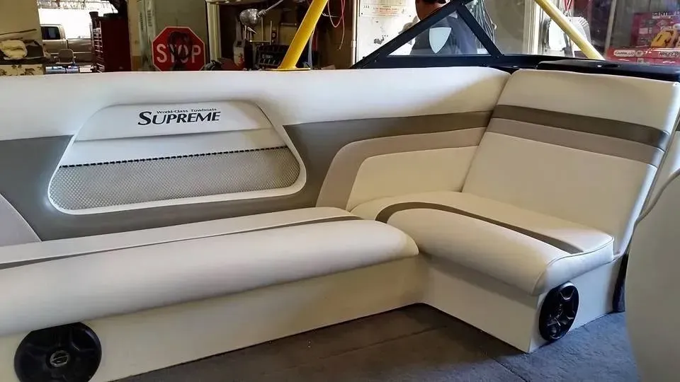 The inside of a boat with a stop sign in the background