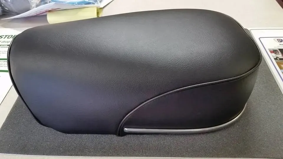 A black object is sitting on top of a table.