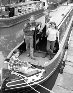 Family aboard narrowboat in the 1950's