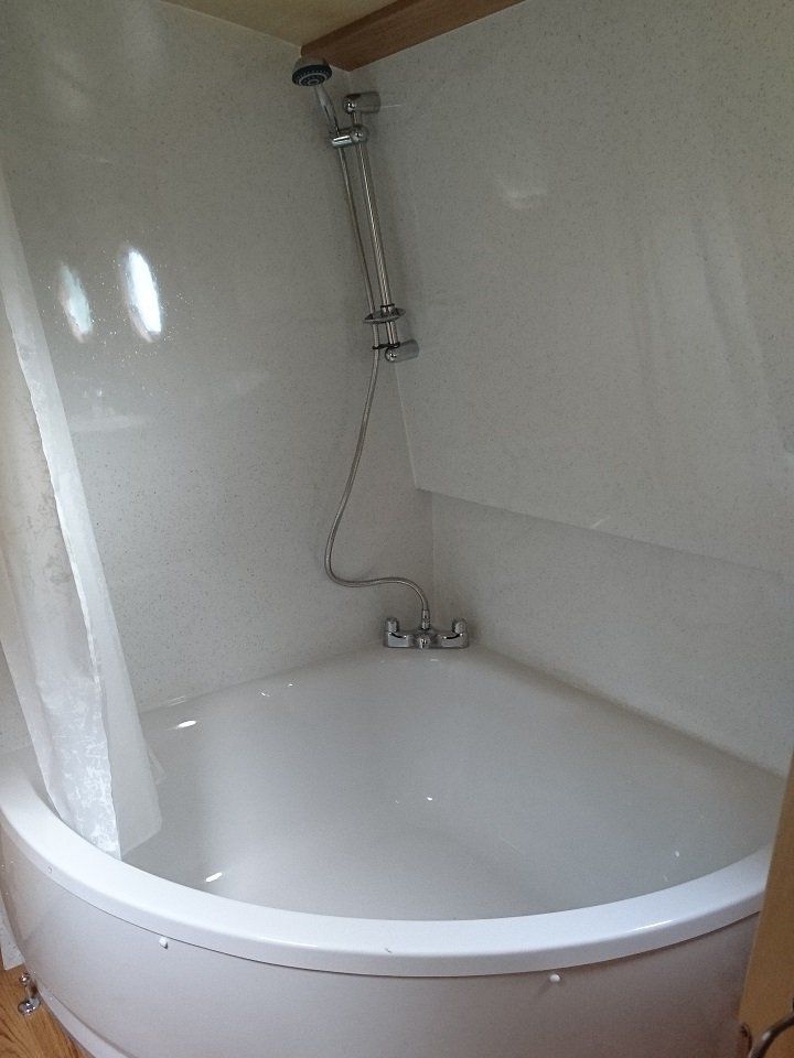 Beltane Spirit corner shower bath