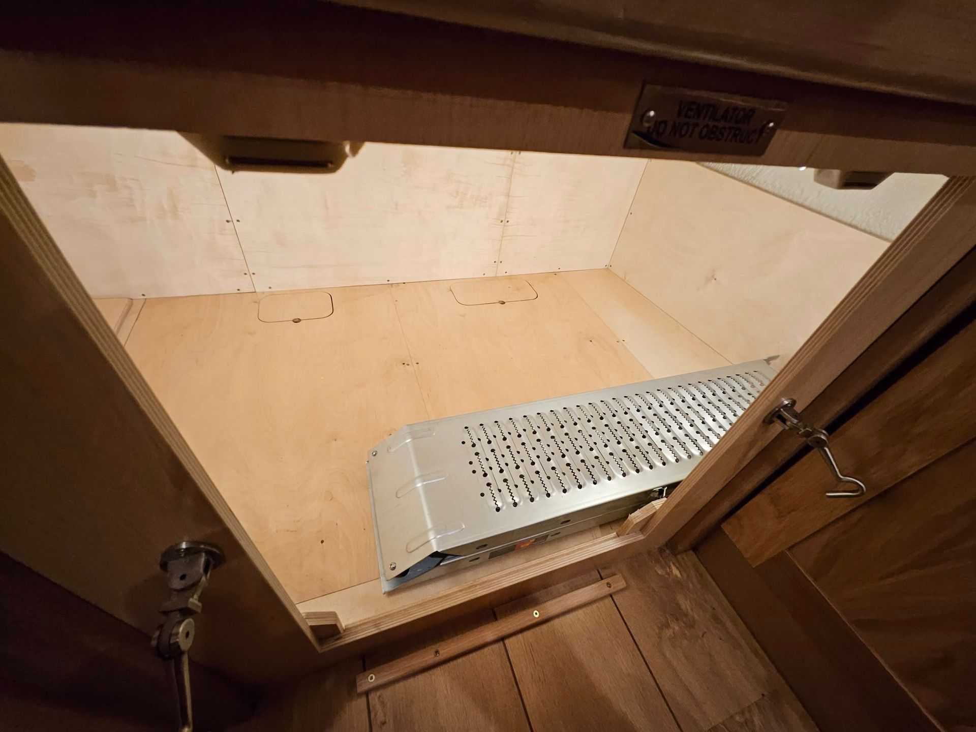 Damselfly under well deck storage