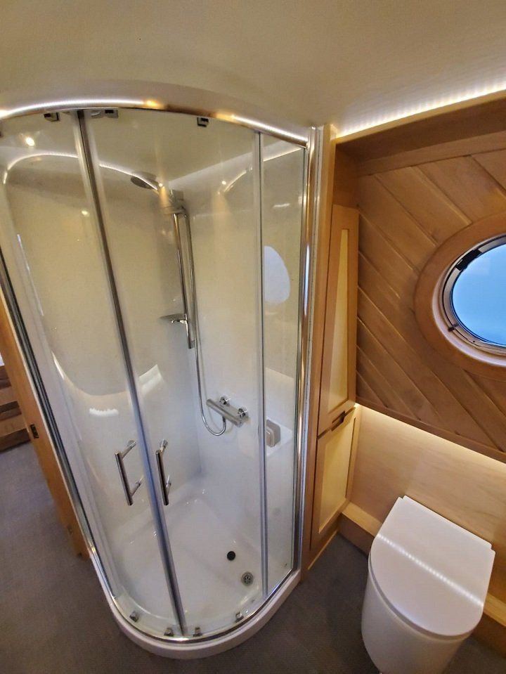 Flutterby walk through shower room