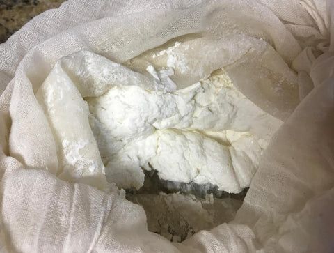 chevre cheese wrapped in cheesecloth